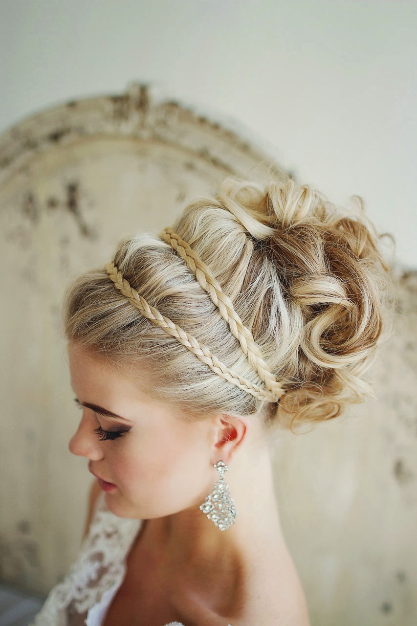 winter wedding up do with braids and sparkly earrings