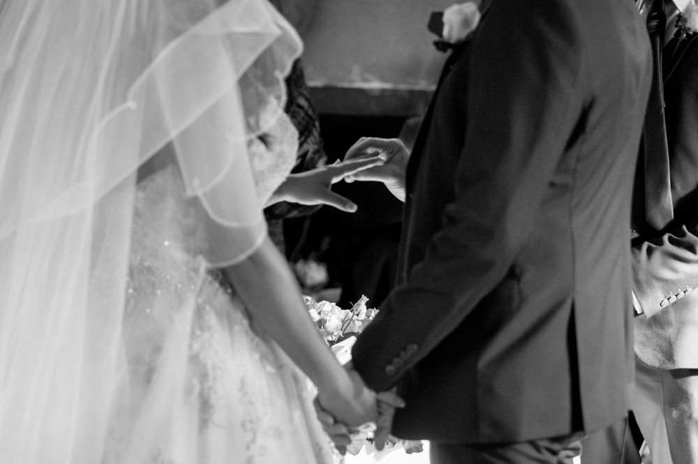 tryfonas wed ceremony couple with rings 13