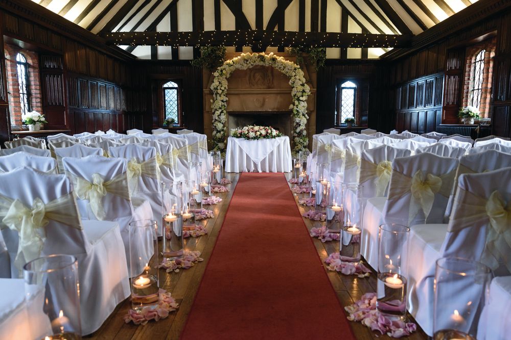 tryfonas wed room with altar chairs candles lit 9