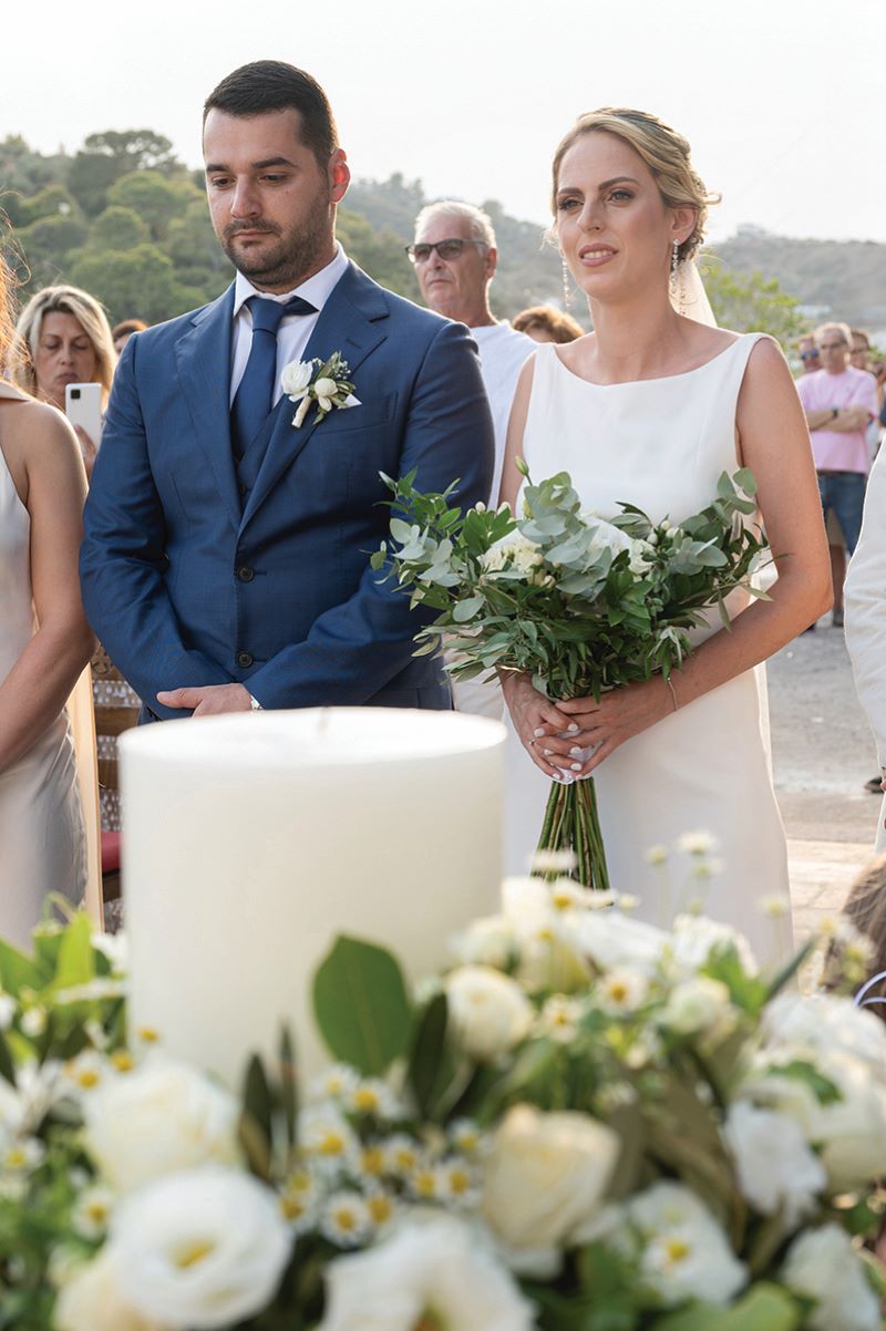 16 COUPLE BEFORE PRIEST